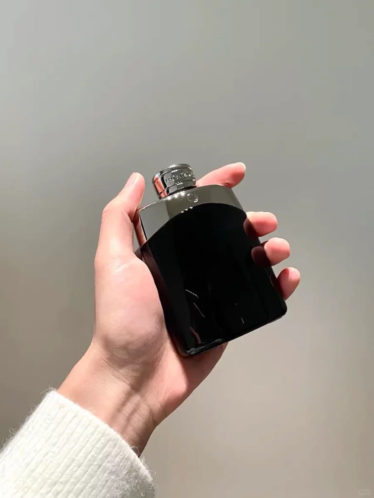 hand holding Montblanc Legend fragrance